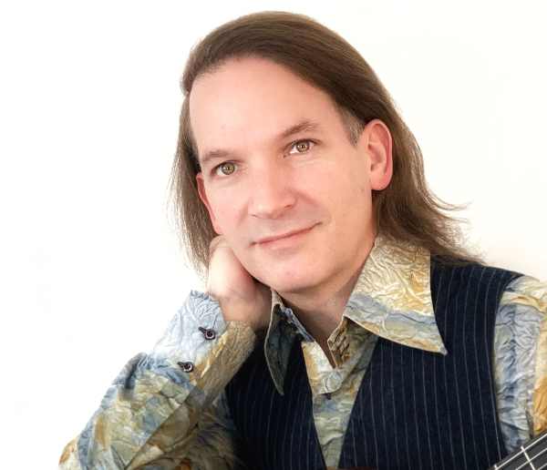 A profile picture of guitarist Marco Tamayo